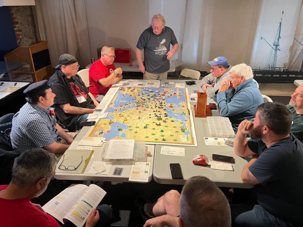 Mark McLaughlin GMs his classic design Napoleonic Wars at SDHistCon East 2024 at the US Navy War College Museum. The French led by Harold dominate to a year one victory as the world watches.