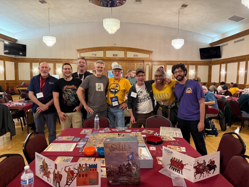 Designers and content creators playing Seljuk at SDHistCon Summit 2025.